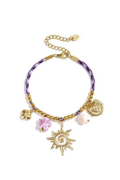 Colorful cord bracelet with varying pendants purple