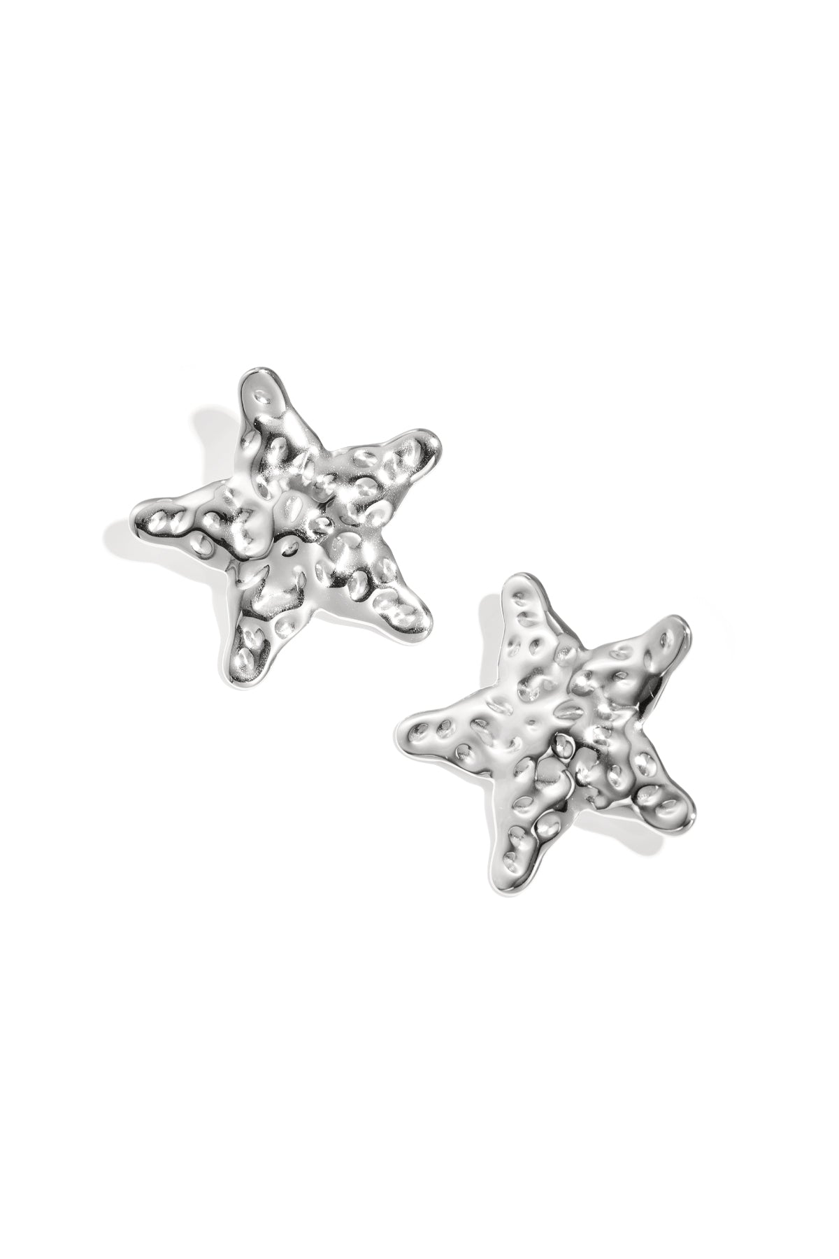 Dented star earrings