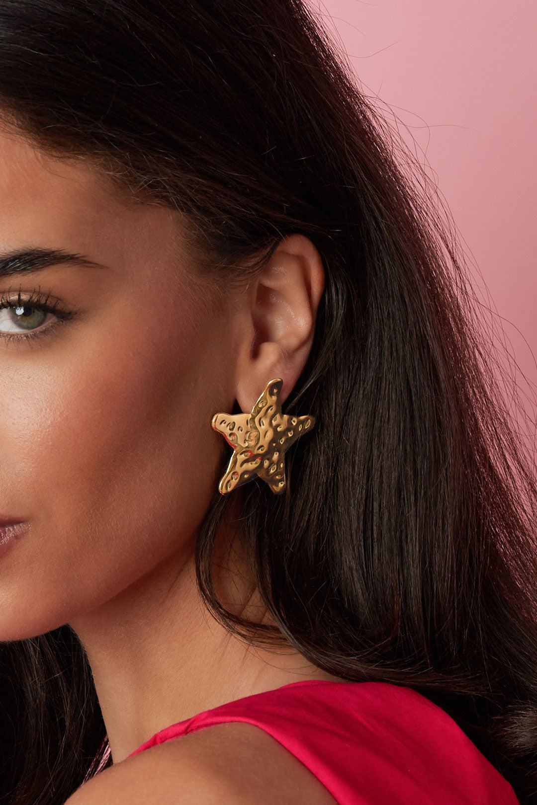 Dented star earrings